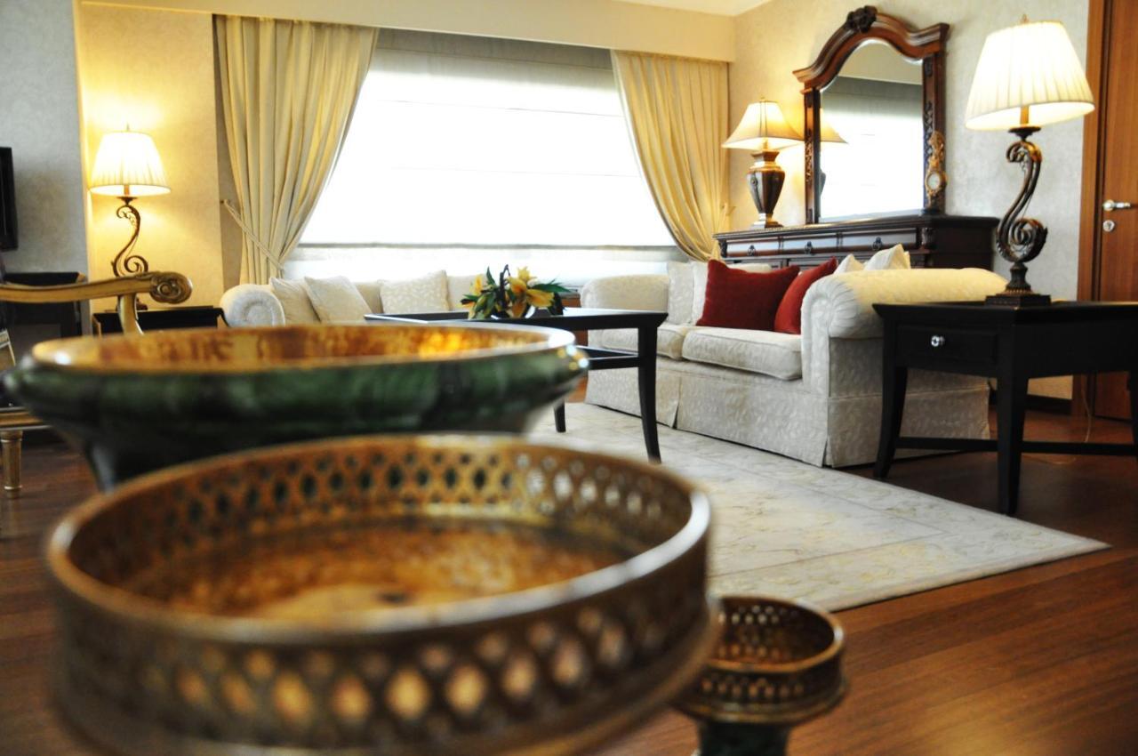 Suite met Kingsize Bed en Uitzicht op Zee